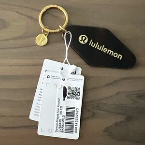 Lulu Lemon Diamond Shaped Hotel  Keychain NWT